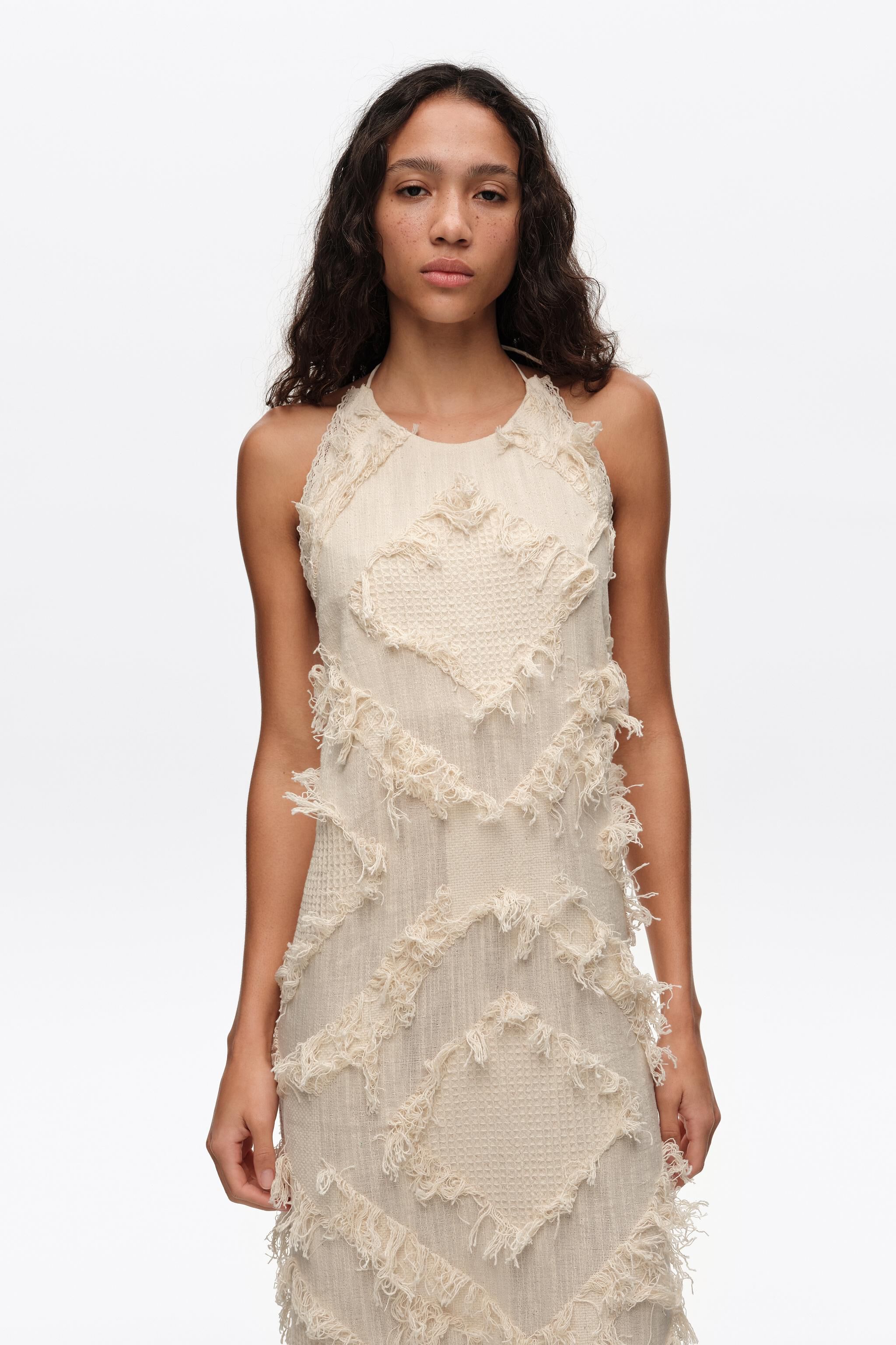 Ivory-Halterneck-Kleid mit Quasten