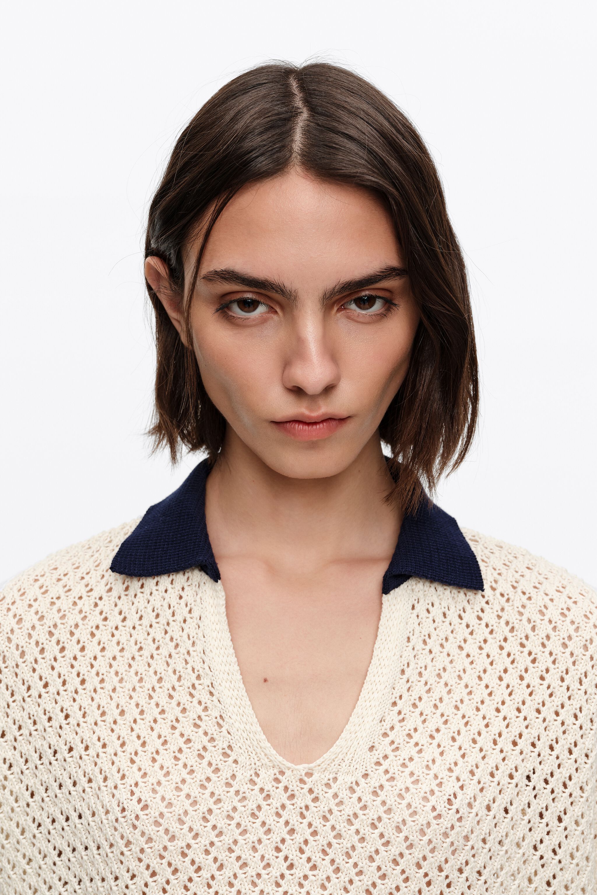 Ivory Strickpullover aus Baumwolle mit Lochmuster