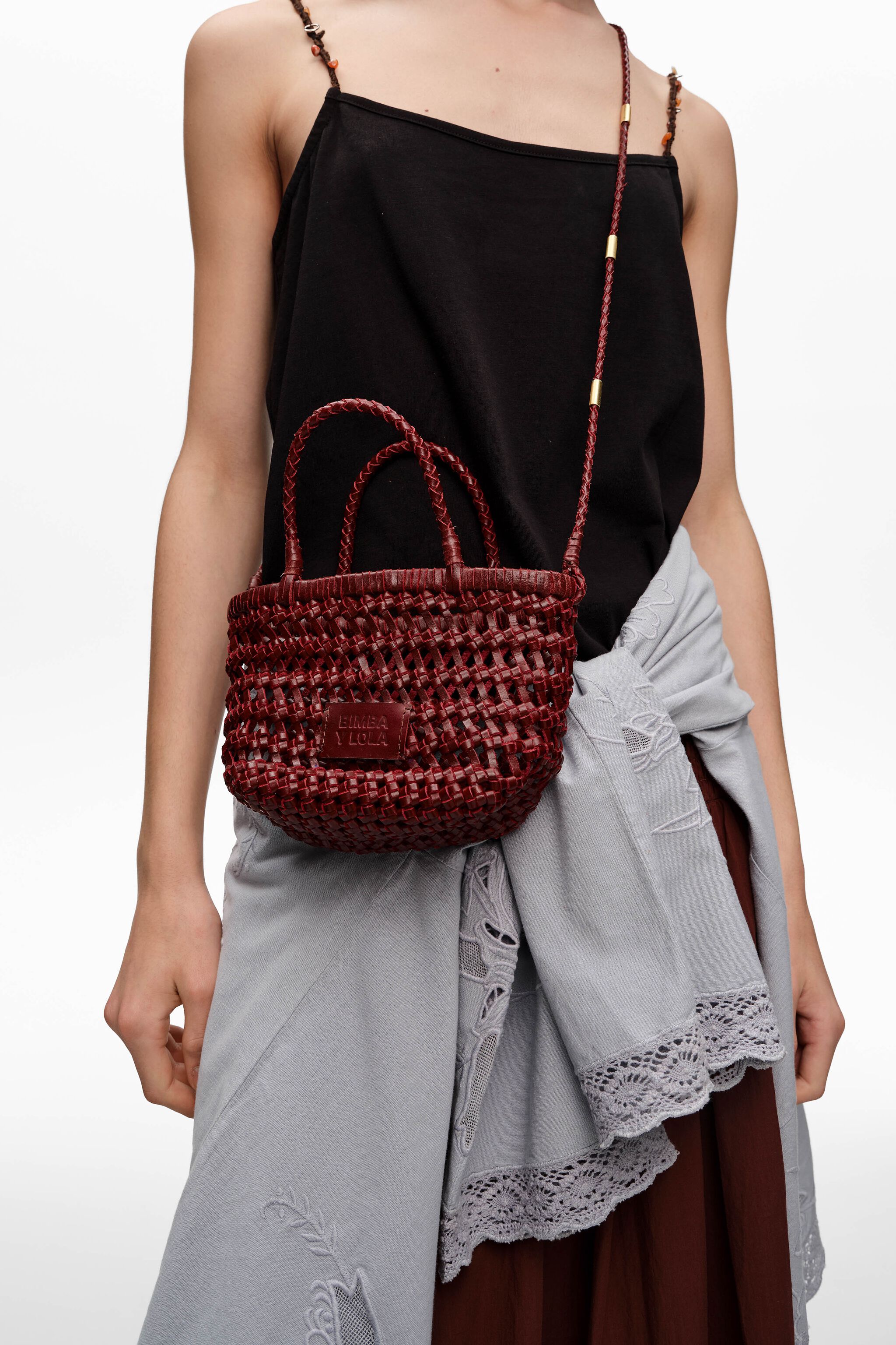 Dunkelrote Leder-Geheimtasche im Geflecht-Stil