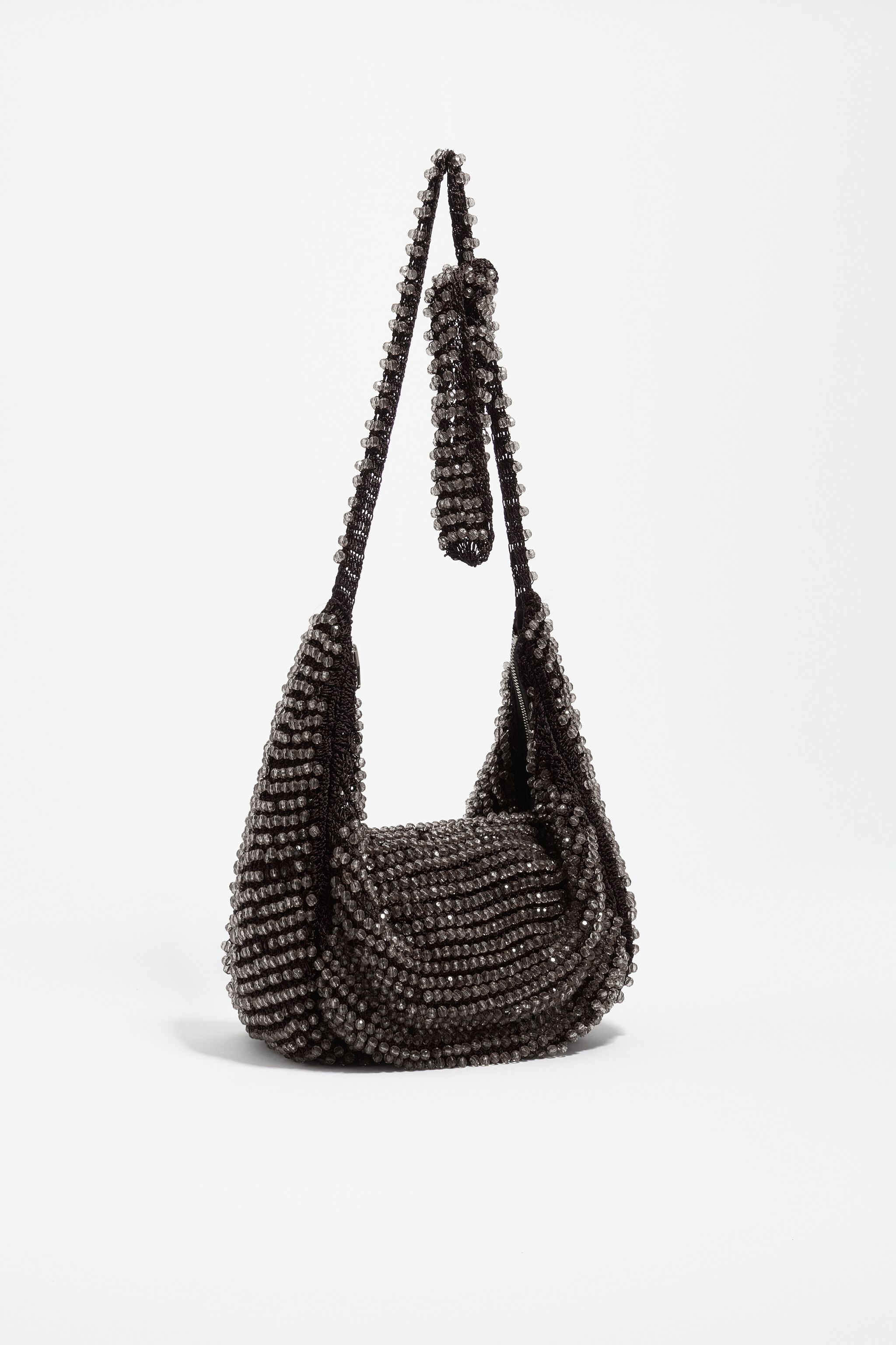 Kleine schokoladenfarbene geknotete Häkel-Tasche