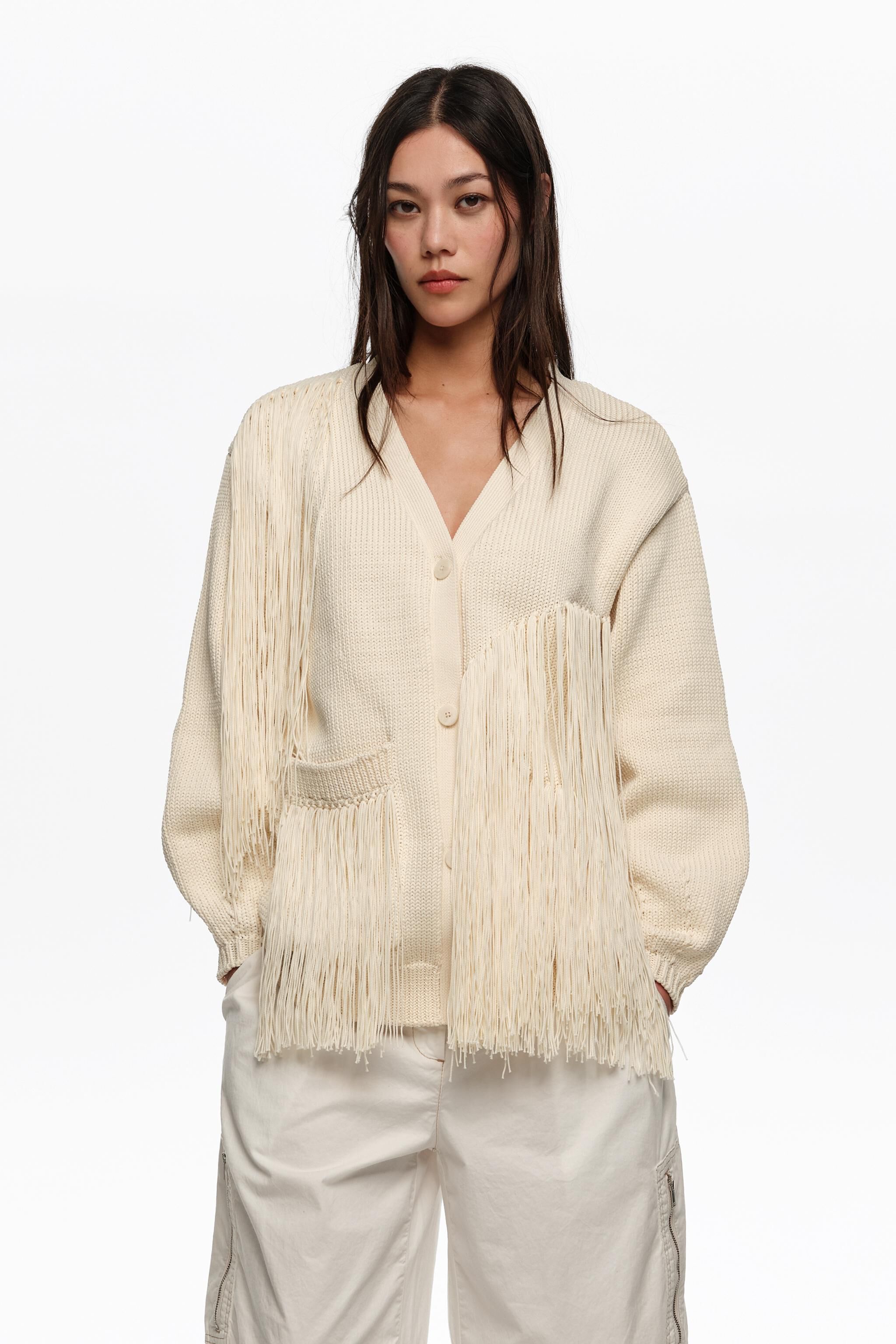 Ivory kragenlose Strickweste mit Fransen