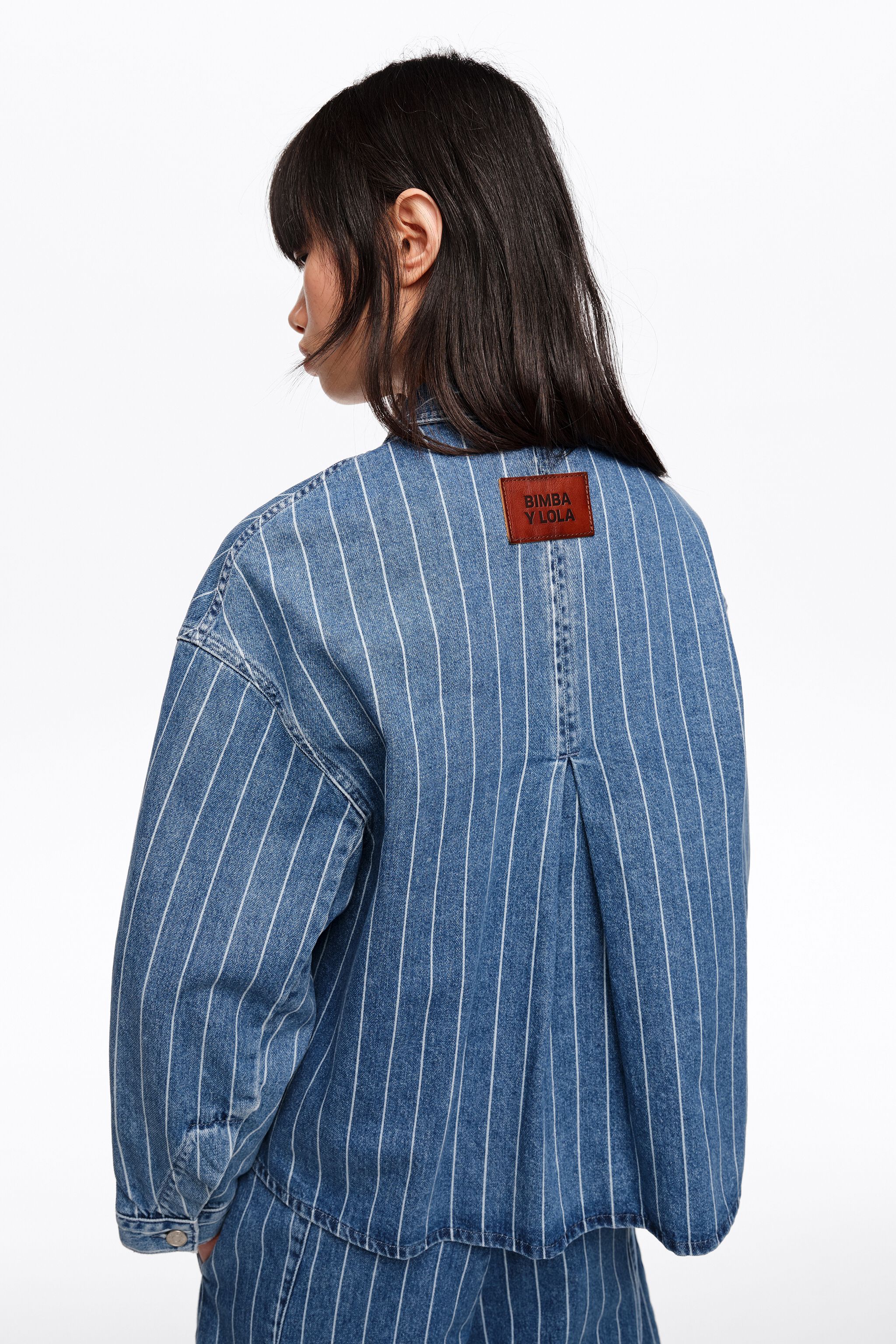 Verblassene A-Linie Denimjacke mit blauen Streifen