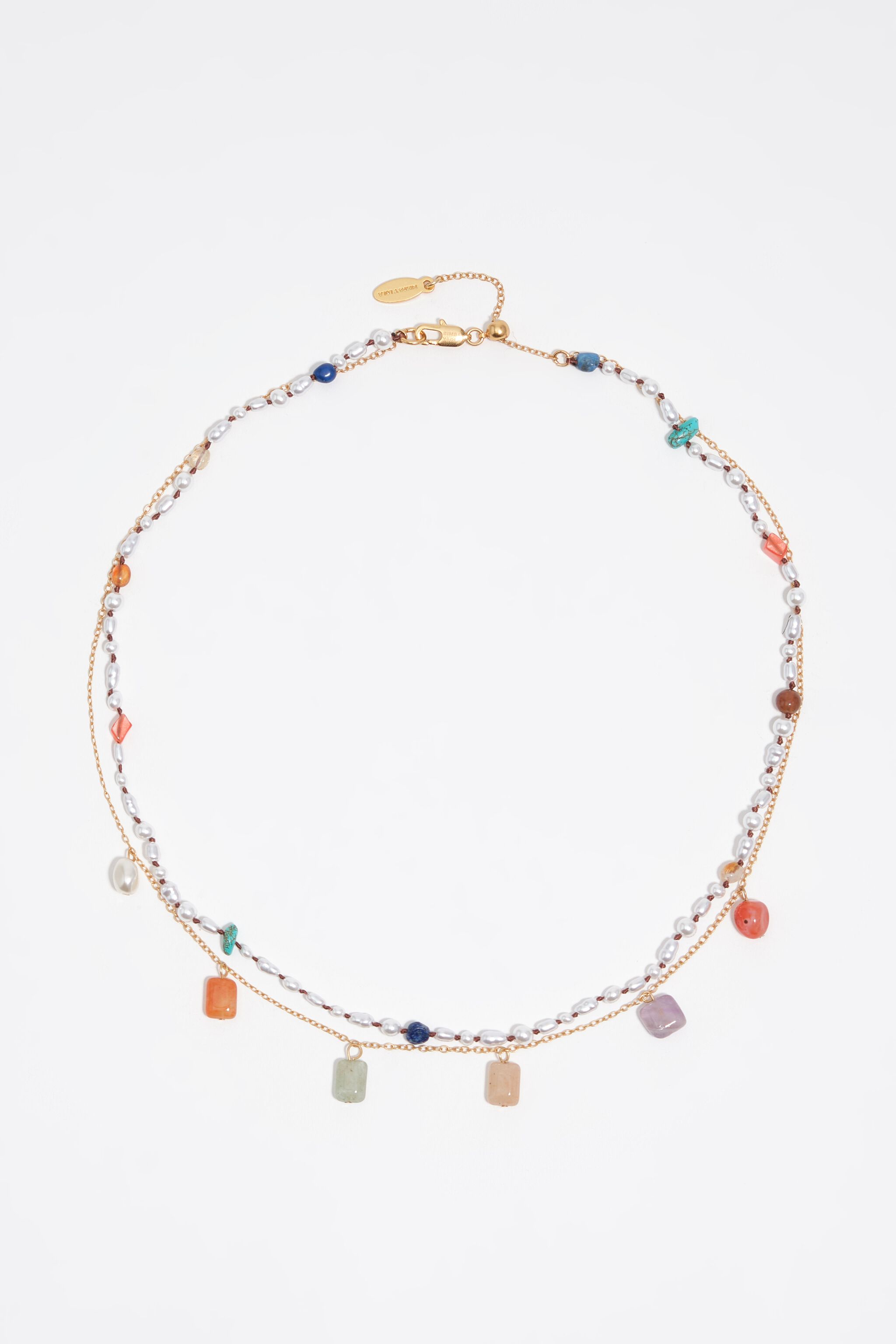 Doppelschmuck aus mehrfarbigen Steinen und Perlen