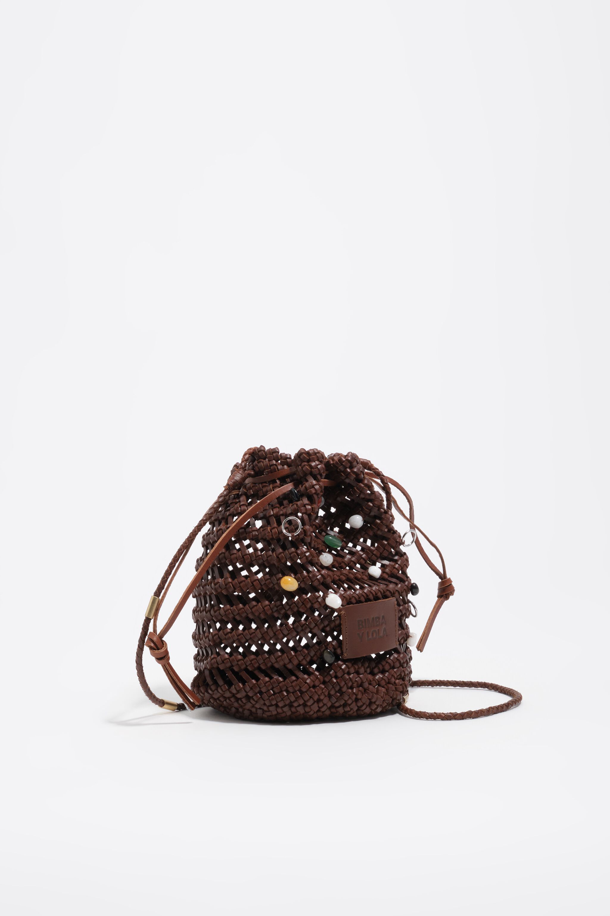 Kleinhandtasche aus geflochtenem Walnussholzleder