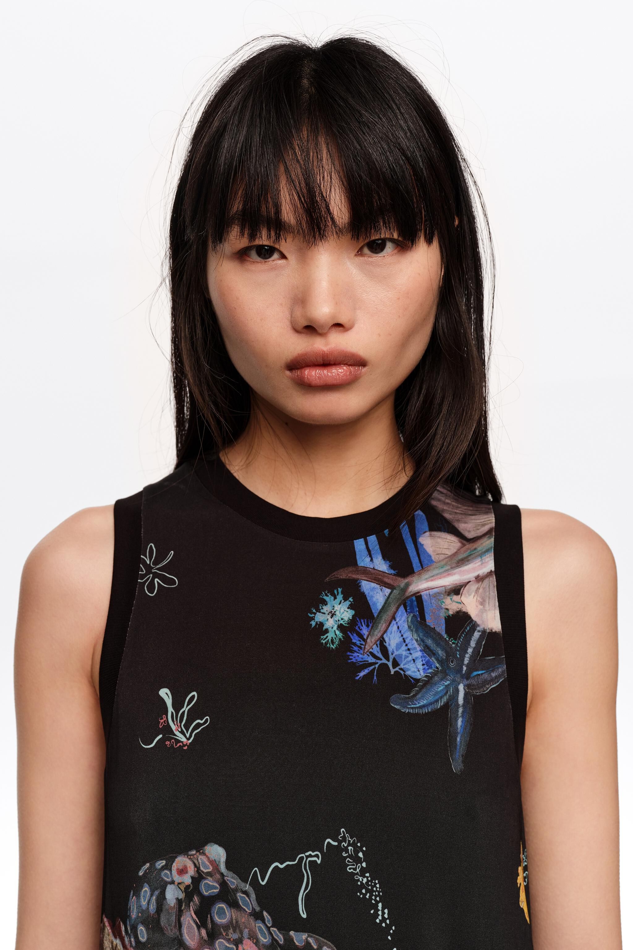 Seabed schwarzes fließendes ärmelloses T-Shirt-Kleid