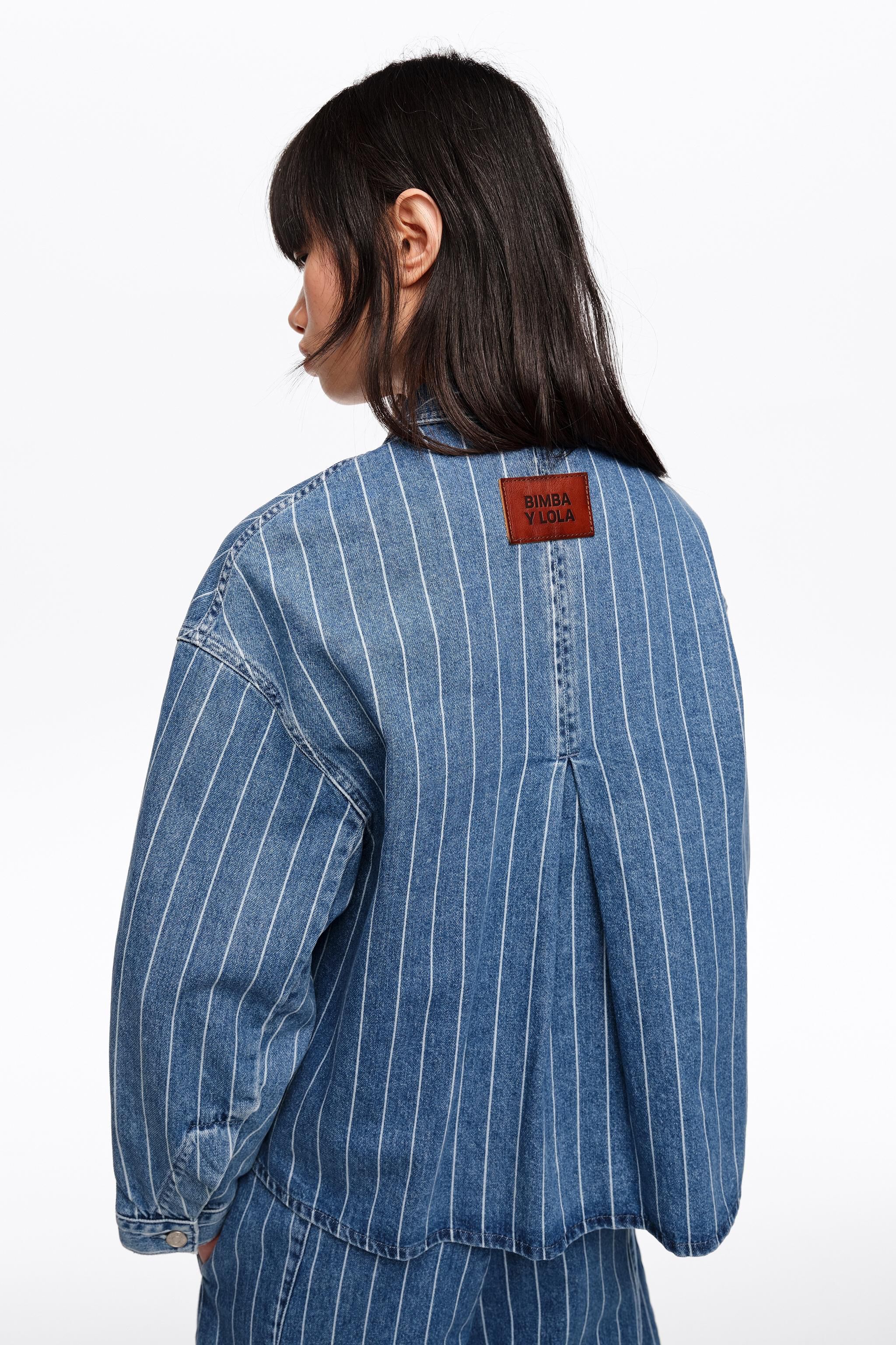Verblassene A-Linie Denimjacke mit blauen Streifen