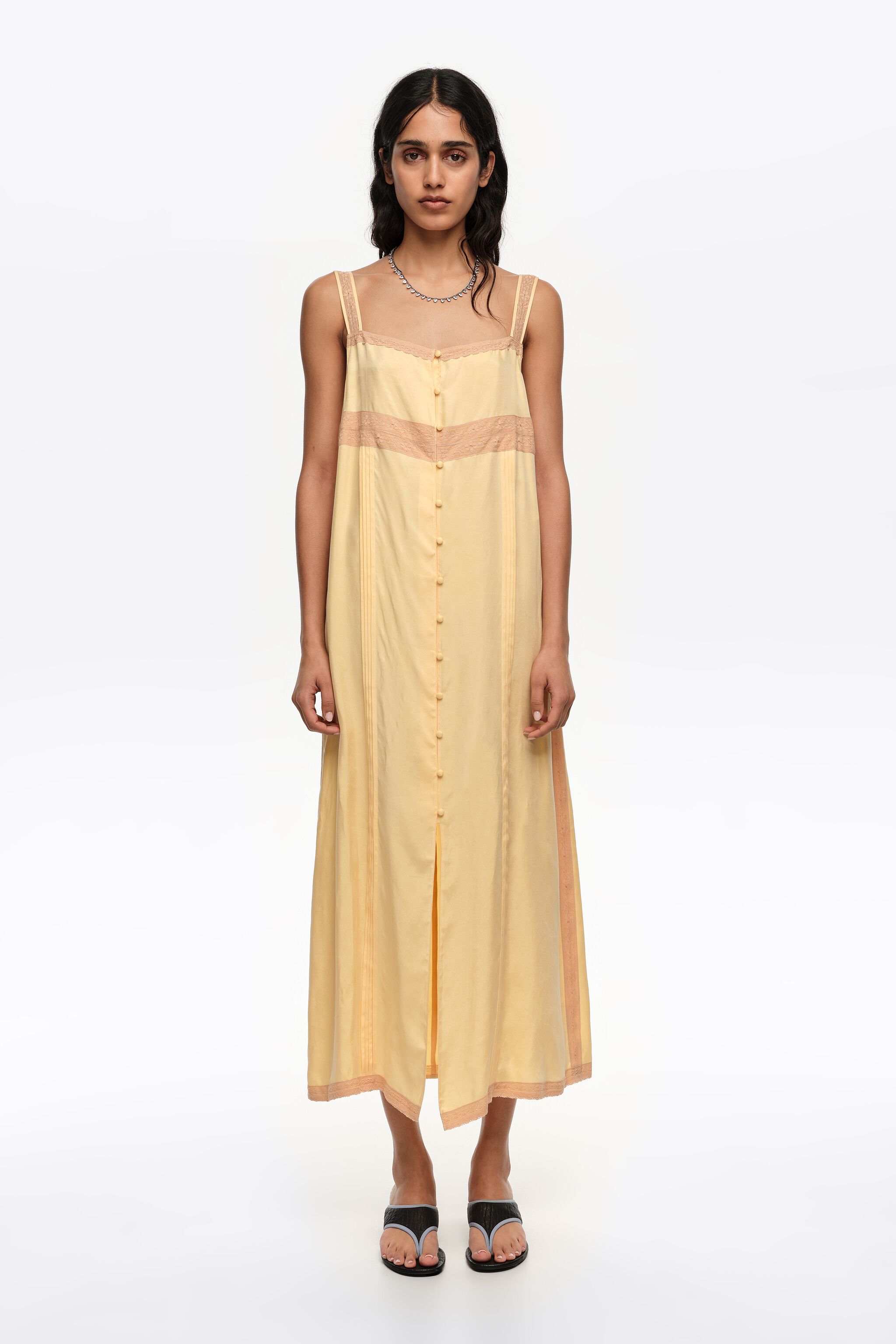 Gelbes A-Linien-Kleid mit Knöpfen und Spitze