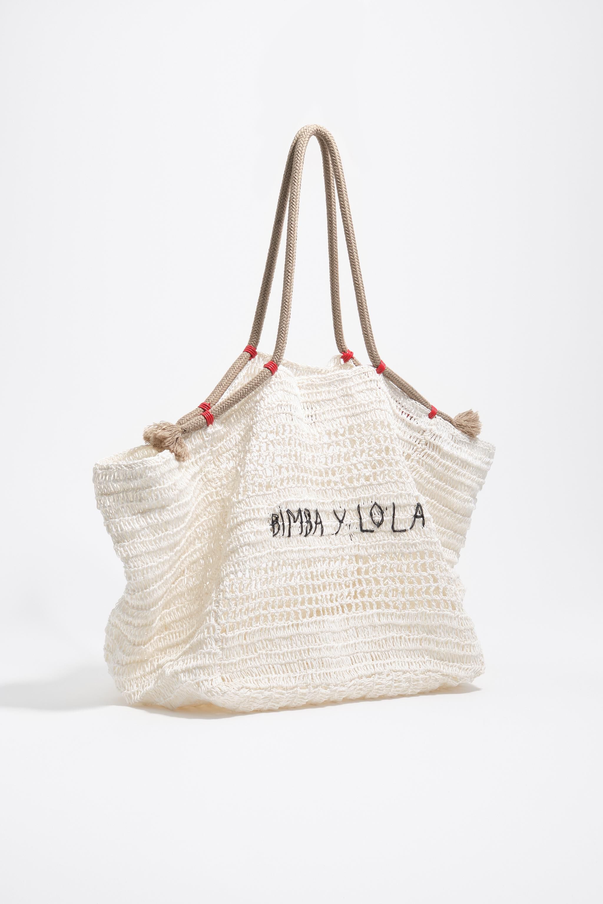 Große weiße Papiertasche mit Schultergurt