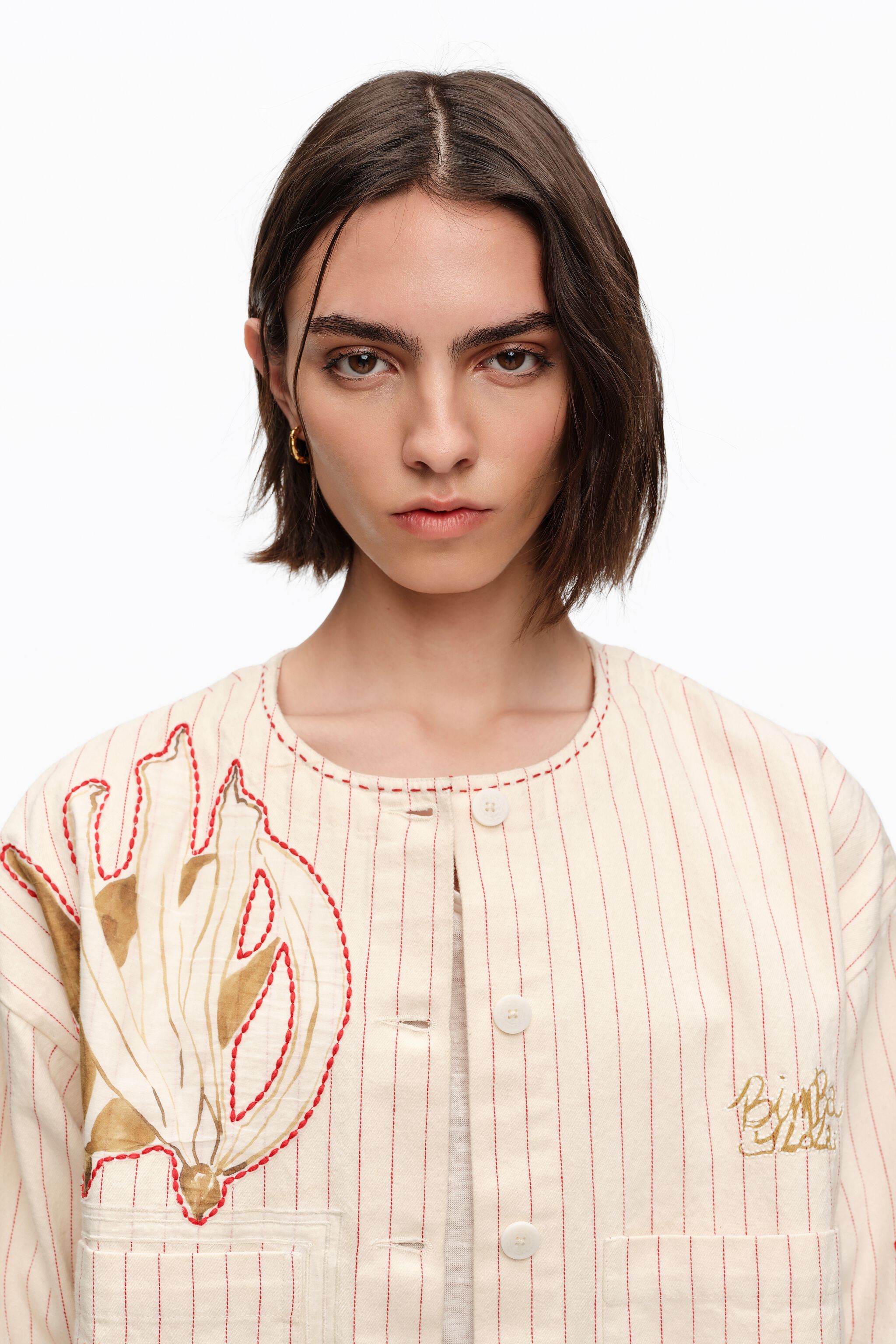Ivory-Jacke mit Naht- und Streifenprints